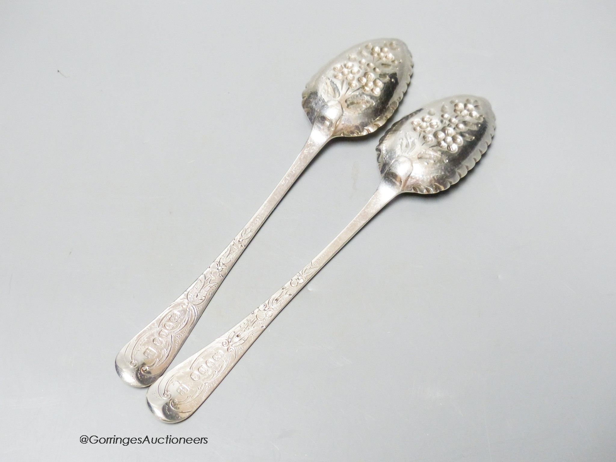 A pair of George III silver Old English pattern 'berry' spoons, Smith & Fearn, London, 1790, 22cm, 4oz.